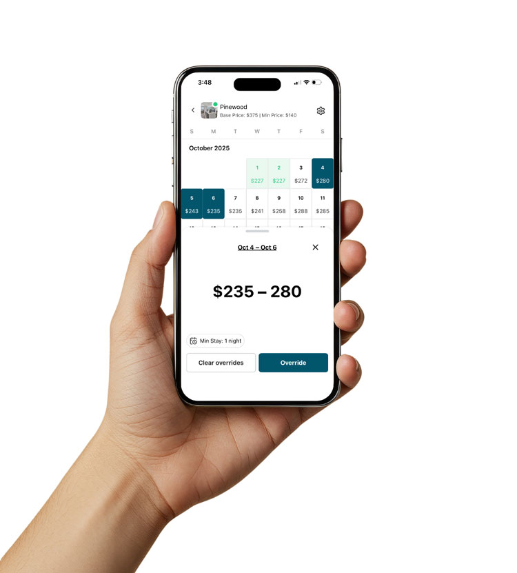 Beyond Pricing mobile app showing the Pinewood property pricing calendar — Base Price $375, Min Price $140, October 2025 rate heatmap with prices $227–288 per night, date-range override for Oct 4-6 showing $235-280. Source: beyondpricing.com/products/beyond-mobile.